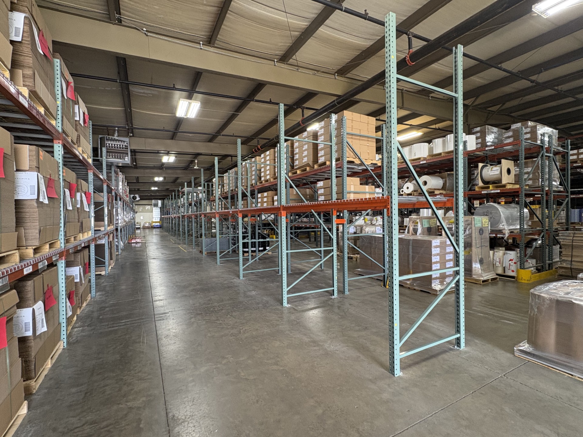 Warehouse aisle with full pallet racking